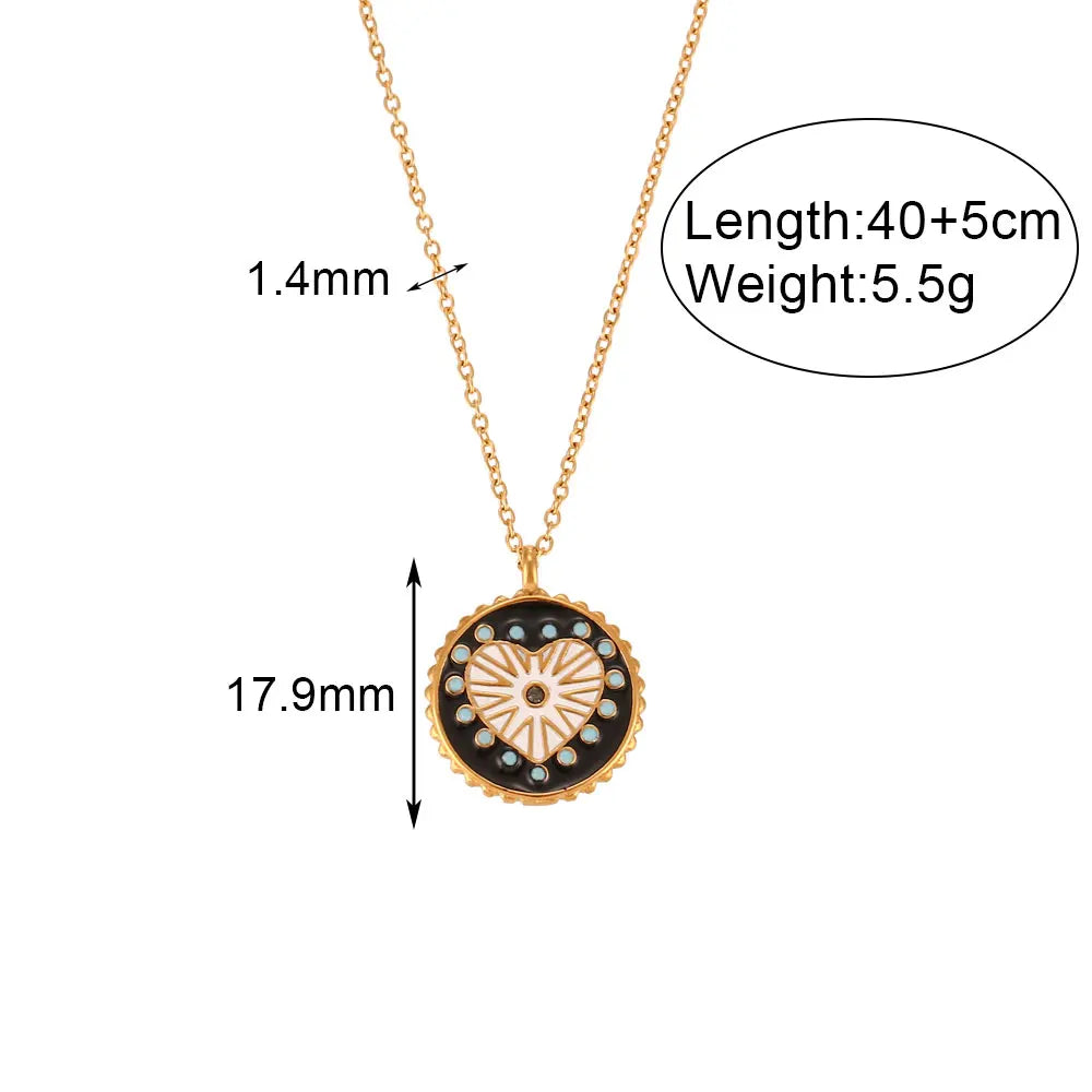 Double-Sided Black & White Enamel Heart Sunburst Necklace