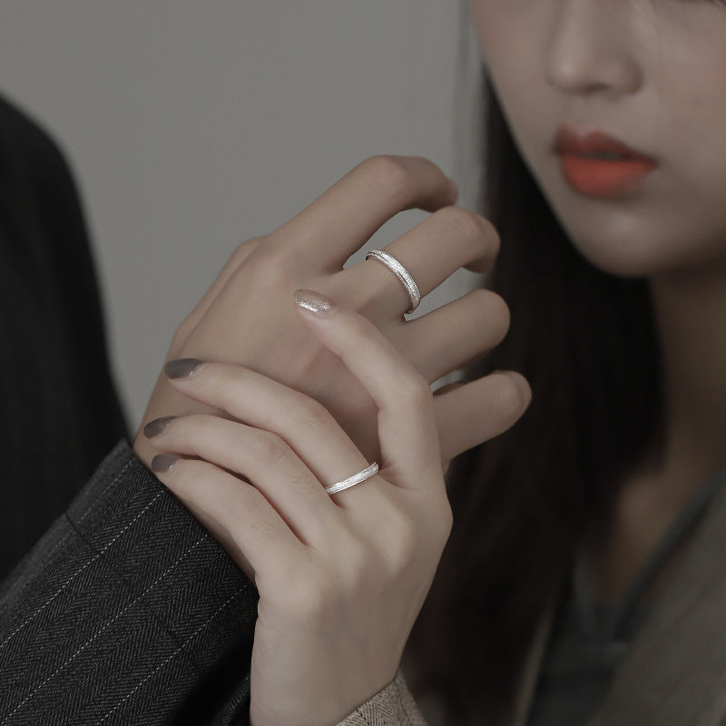 A Pair Of Silver Rings Are Simple