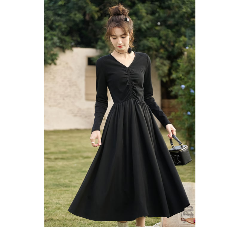 Elegant Black Knitted Smocked V-neck A-line Midi Dress