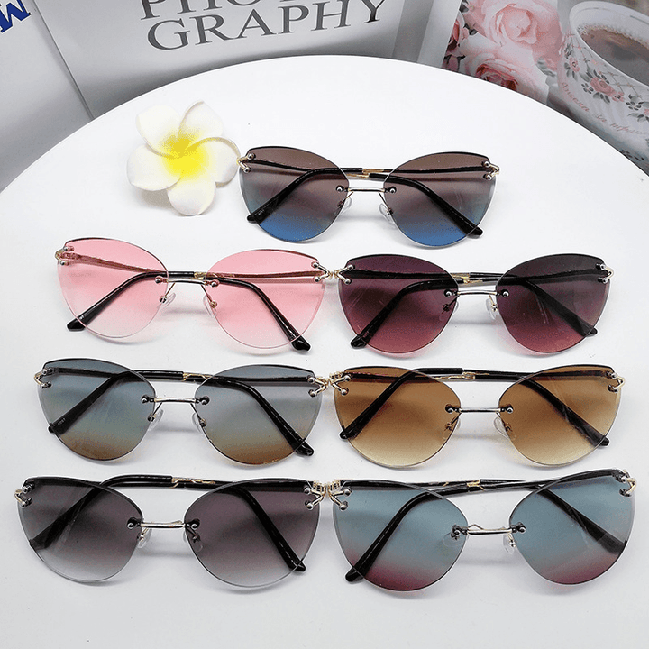 Classic Ocean Film Cat Eye Frameless Cut Edge Sunglasses Fashion Street Shooting Ins Concave Shape Ladies Sunglasses - MRSLM